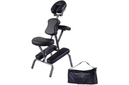 Black folding massage therapy chair with black carrying case