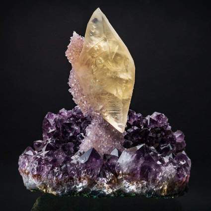 Yellow calcite crystals on amethyst