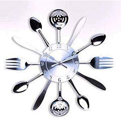 silver kitchen utensil starburst clock