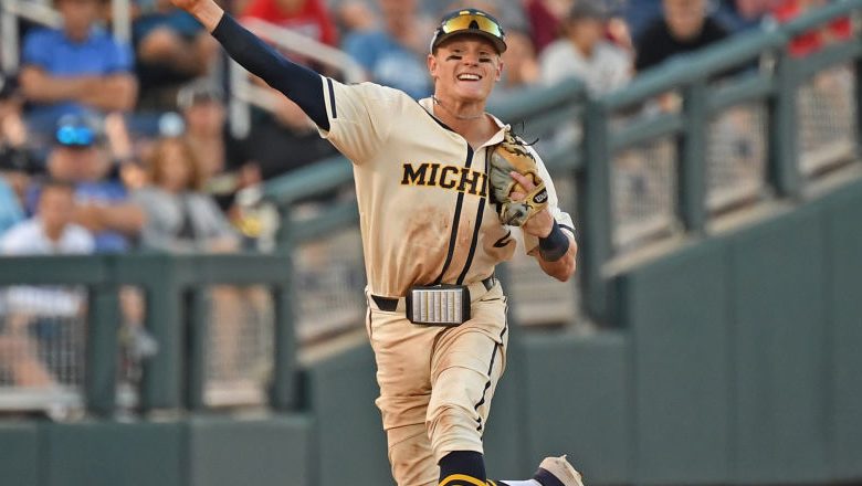 What Is On The Michigan Baseball Players Belts Heavy