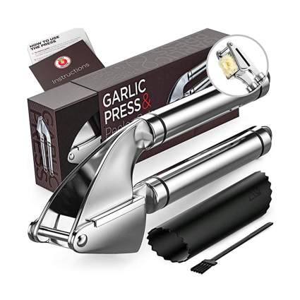 stainless steel garlic press and silicone peeler
