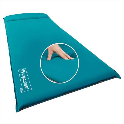 Teal sleeping pad for camping