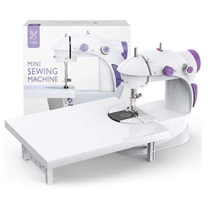 purple and white mini sewing machine