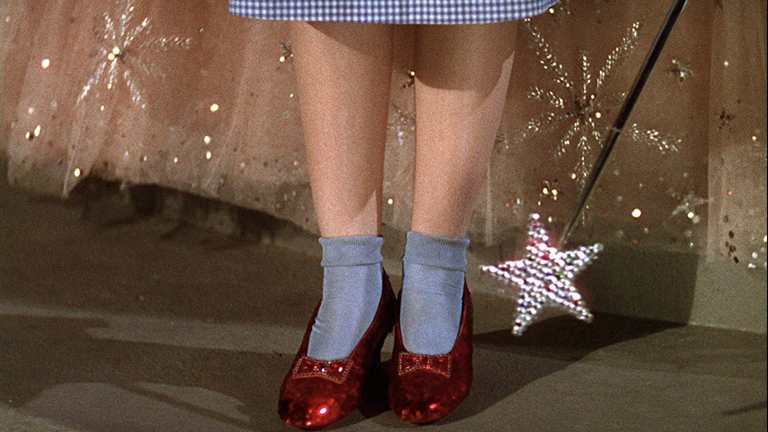 wizard of oz red slippers touch the tornado