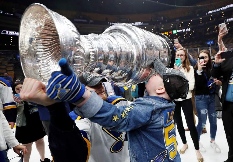Blues superfan Laila Anderson celebrated on the ice with the team when they won the Stanley Cup in June.