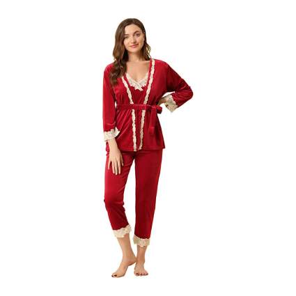 Woman in red velvet pajama set
