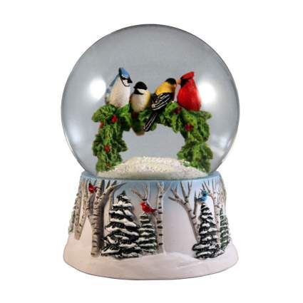 winter birds on a wreath snow globe