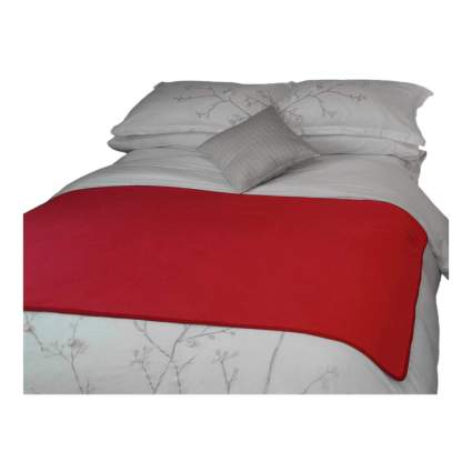 Red throw blanket on bed