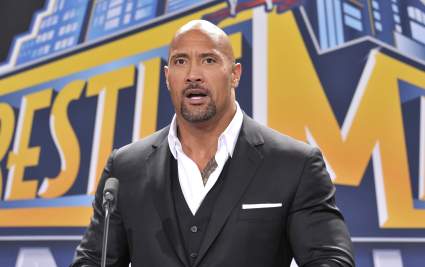 WWE Legend Dwayne “The Rock” Johnson Challenged To Epic Mark Henry Rematch