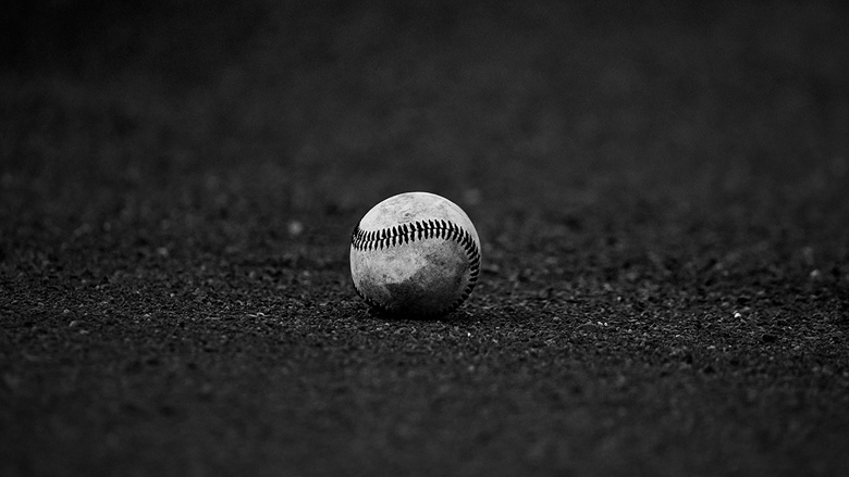 grayscale baseball on field