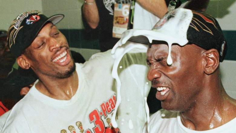 Michael Jordan, at right, doused with Champagne by teammate Dennis Rodman in 1998