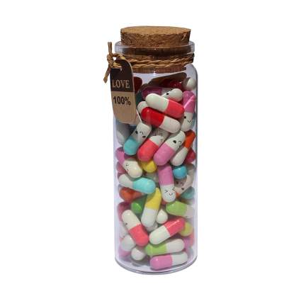 Bottle of colorful pills