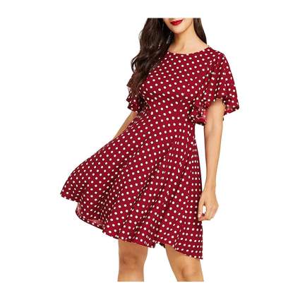 Woman in red polka dot dress