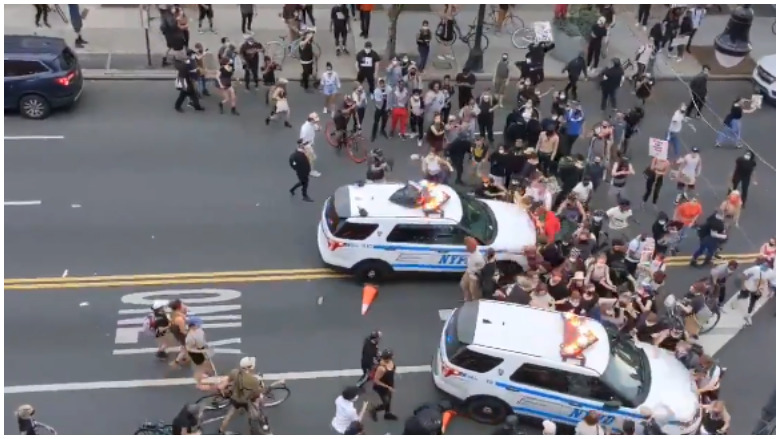 WATCH: NYPD Squad Cars Run Over Protesters in New York | Heavy.com