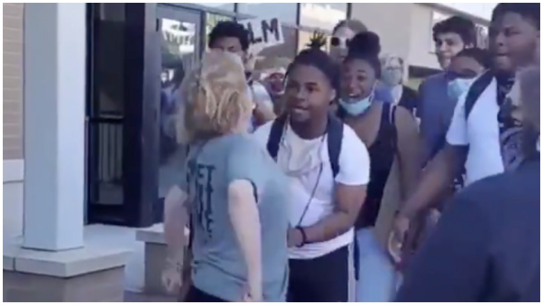 Watch White Woman Spits On Black Teen During Protest 