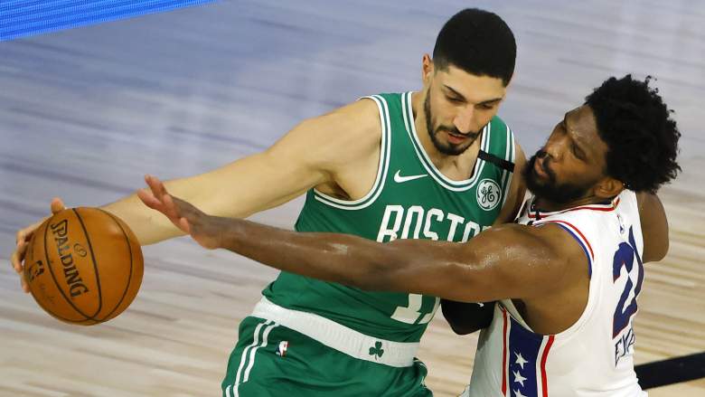 Enes Kanter of the Celtics, battles in the post against Philadelphia's Joel Embiid.