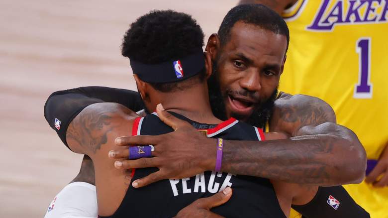 LeBron James hugs Carmelo Anthony after Game 5 of the Lakers-Trail Blazers playoff series.