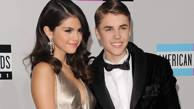Singers Selena Gomez (L) and Justin Bieber arrive at the 2011 American Music Awards held at Nokia Theatre L.A. LIVE on November 20, 2011 in Los Angeles, California.