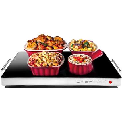Black warming tray with casserole dishes