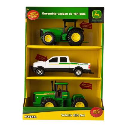 Box of three John Deere tractor die cast toys