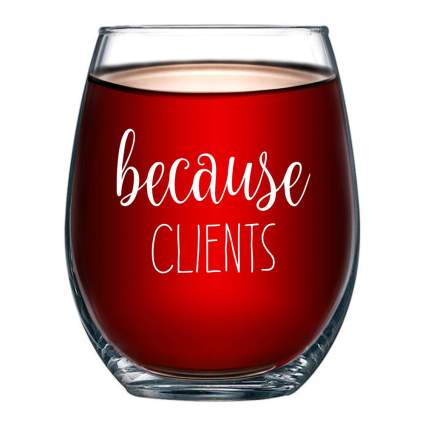 stemless wine glass that says Because Clients
