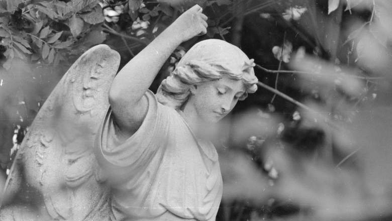 A stone angel guards a grave in Highgate Cemetery, north London.