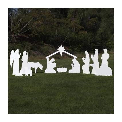 White full-size nativity scene in yard
