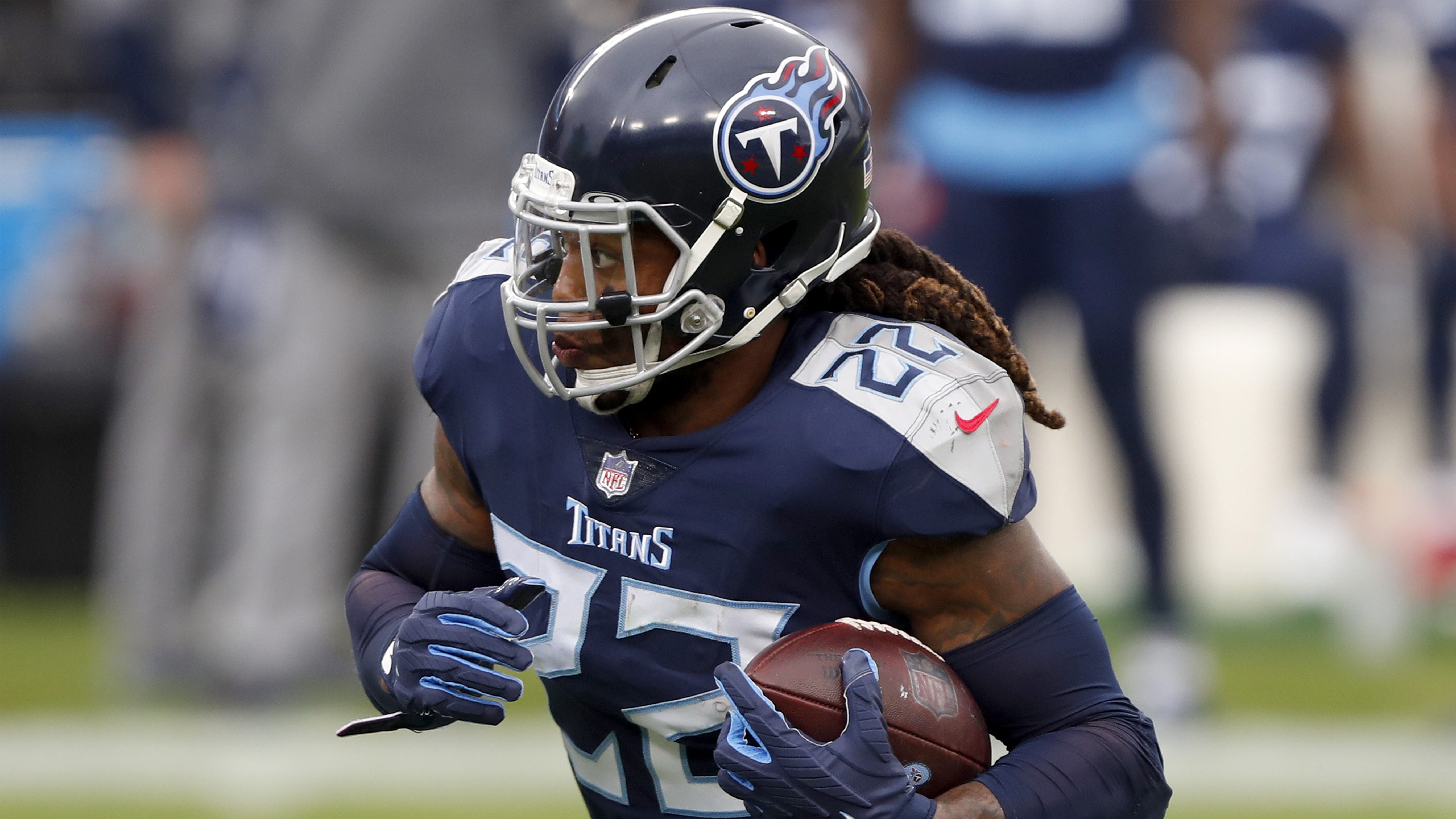 Titans’ Derrick Henry Rocks Lions With Stiff-Arm | Heavy.com