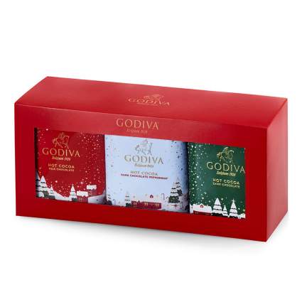 Godiva hot cocoa gift set in holiday tins