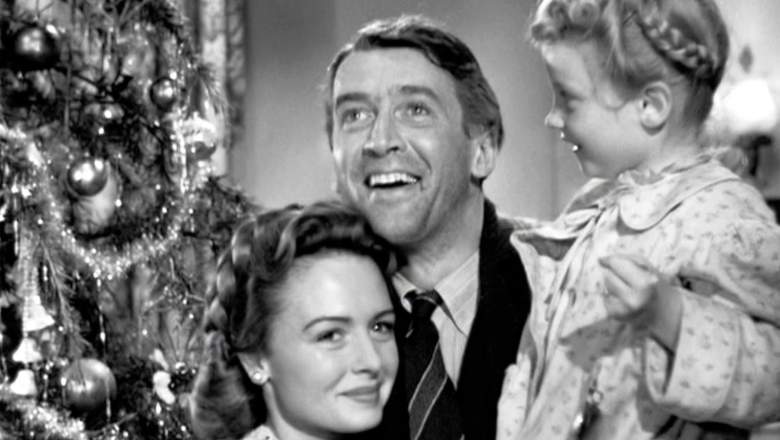 Jimmy Stewart, Donna Reed, and Karolyn Grimes in It's a Wonderful Life