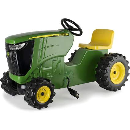 Green John Deere pedal tractor toy