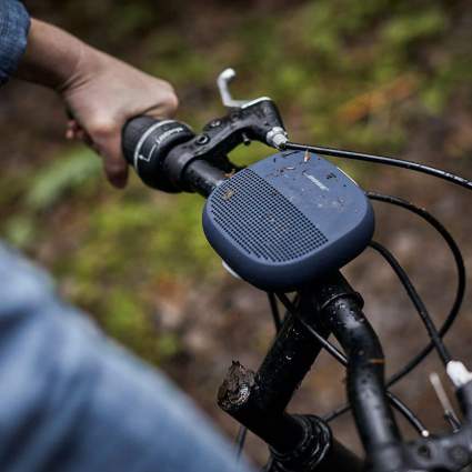 black waterproof Bose speaker on a bike