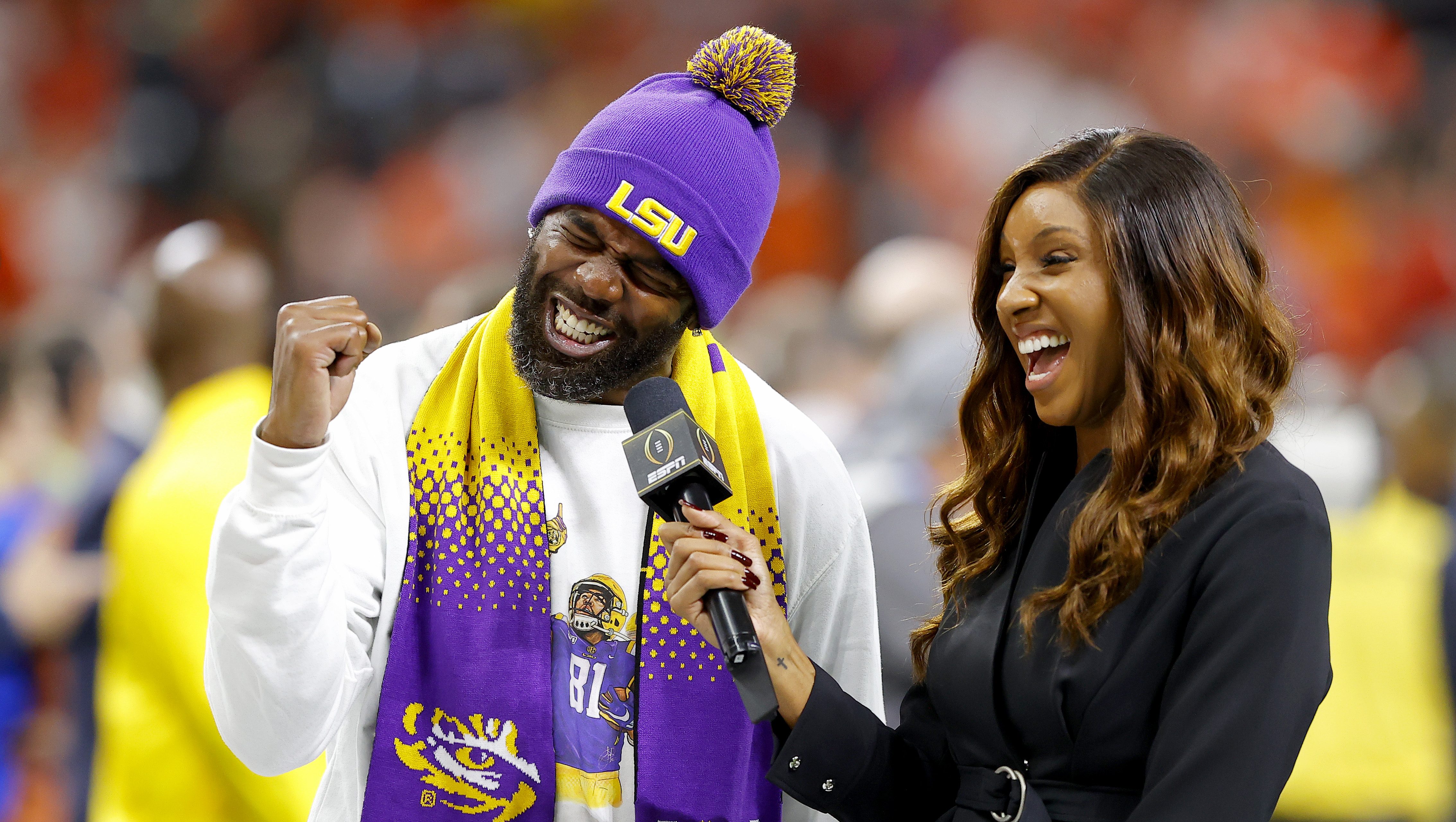 Wide receiver Randy Moss of the Minnesota Vikings smiles as he