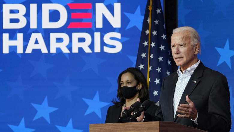 Democratic presidential nominee Joe Biden speaks as vice presidential nominee Sen. Kamala Harris (D-CA) listens at The Queen theater on November 05, 2020