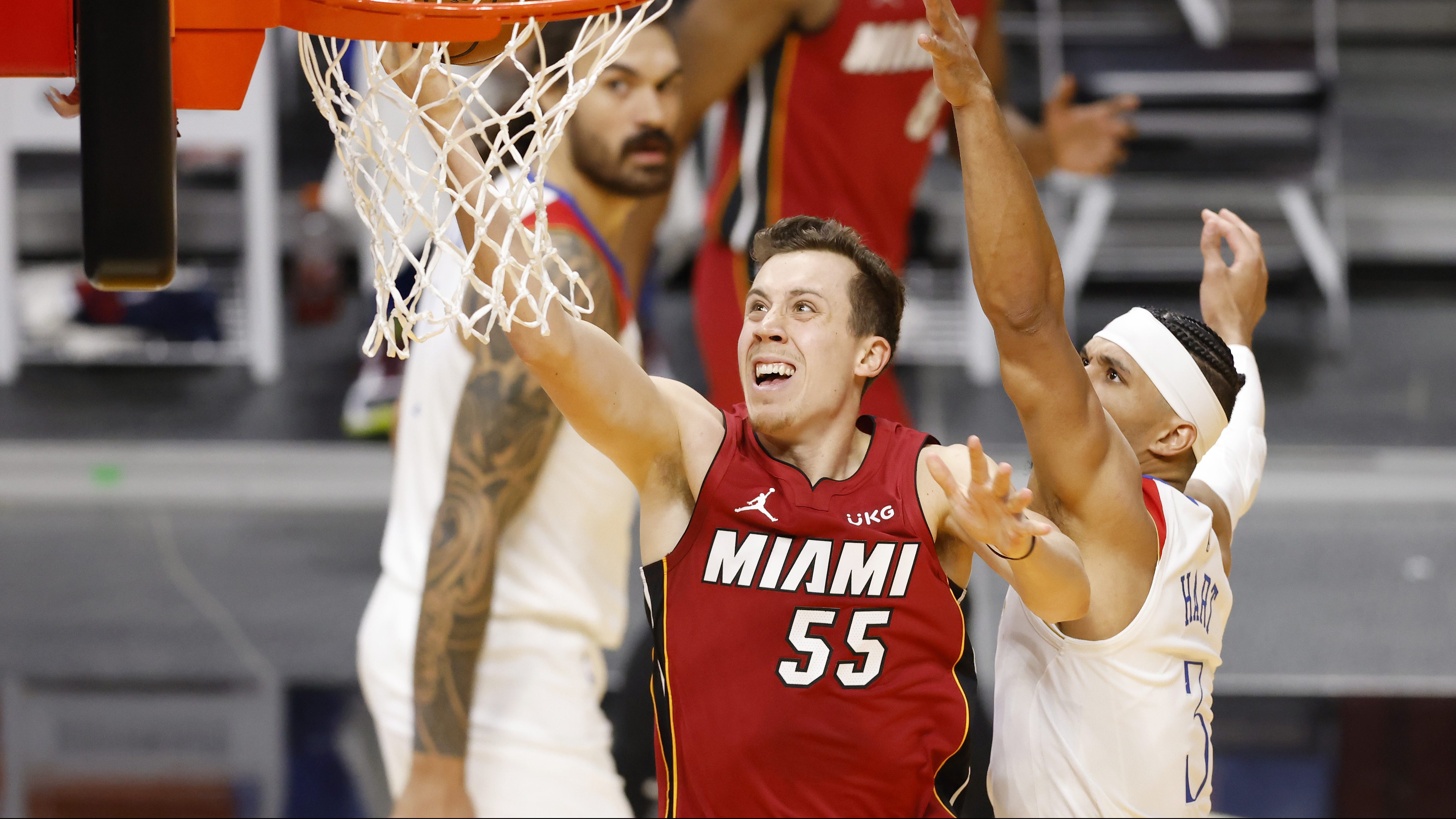 Miami Heat guard Jason Williams stares at an official after being