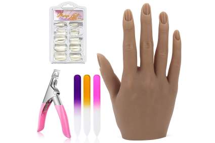 One silicone trainer hand with nail tips, nail files, and clippers