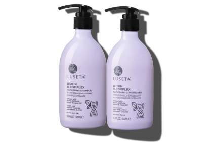Light purple shampoo and conditioner bottles