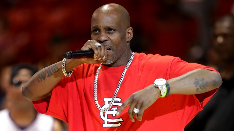 DMX holding a microphone.