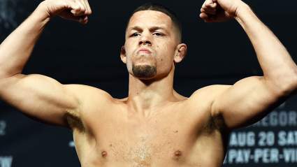 Star Sends Message to Nate Diaz While Holding Guns: ‘I’m Coming’