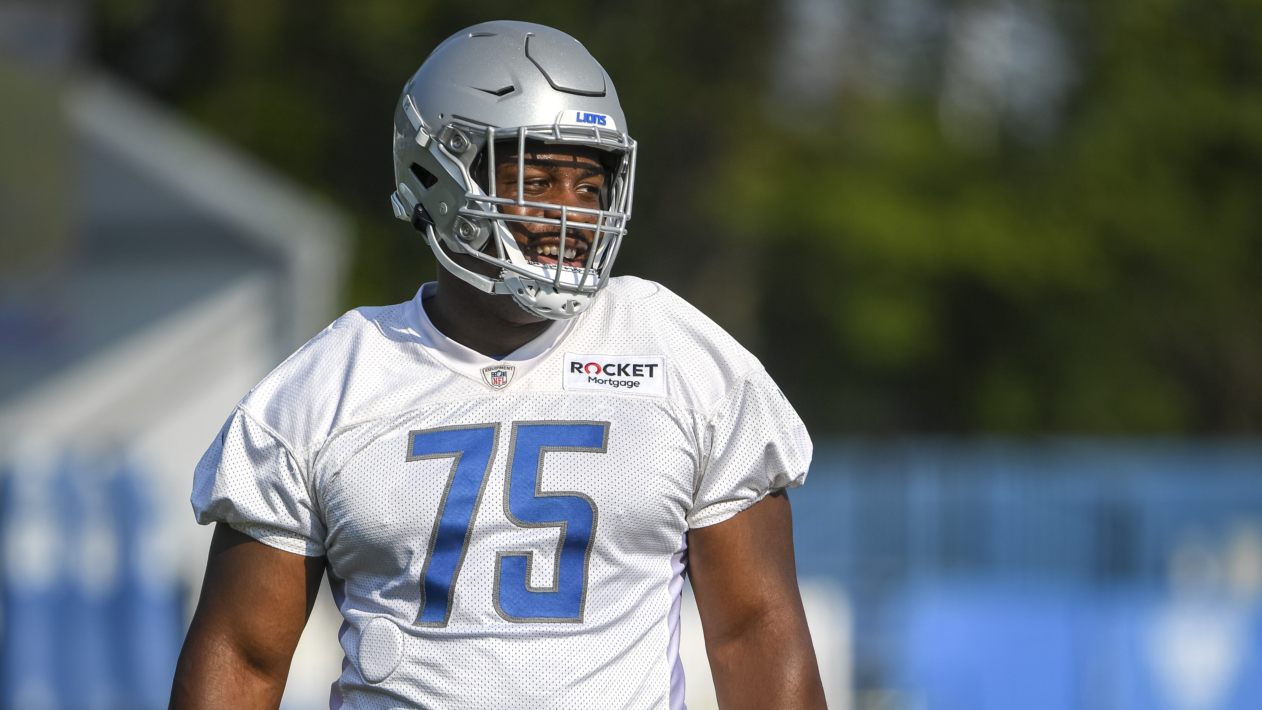 Detroit Lions defensive tackle Levi Onwuzurike warms up during