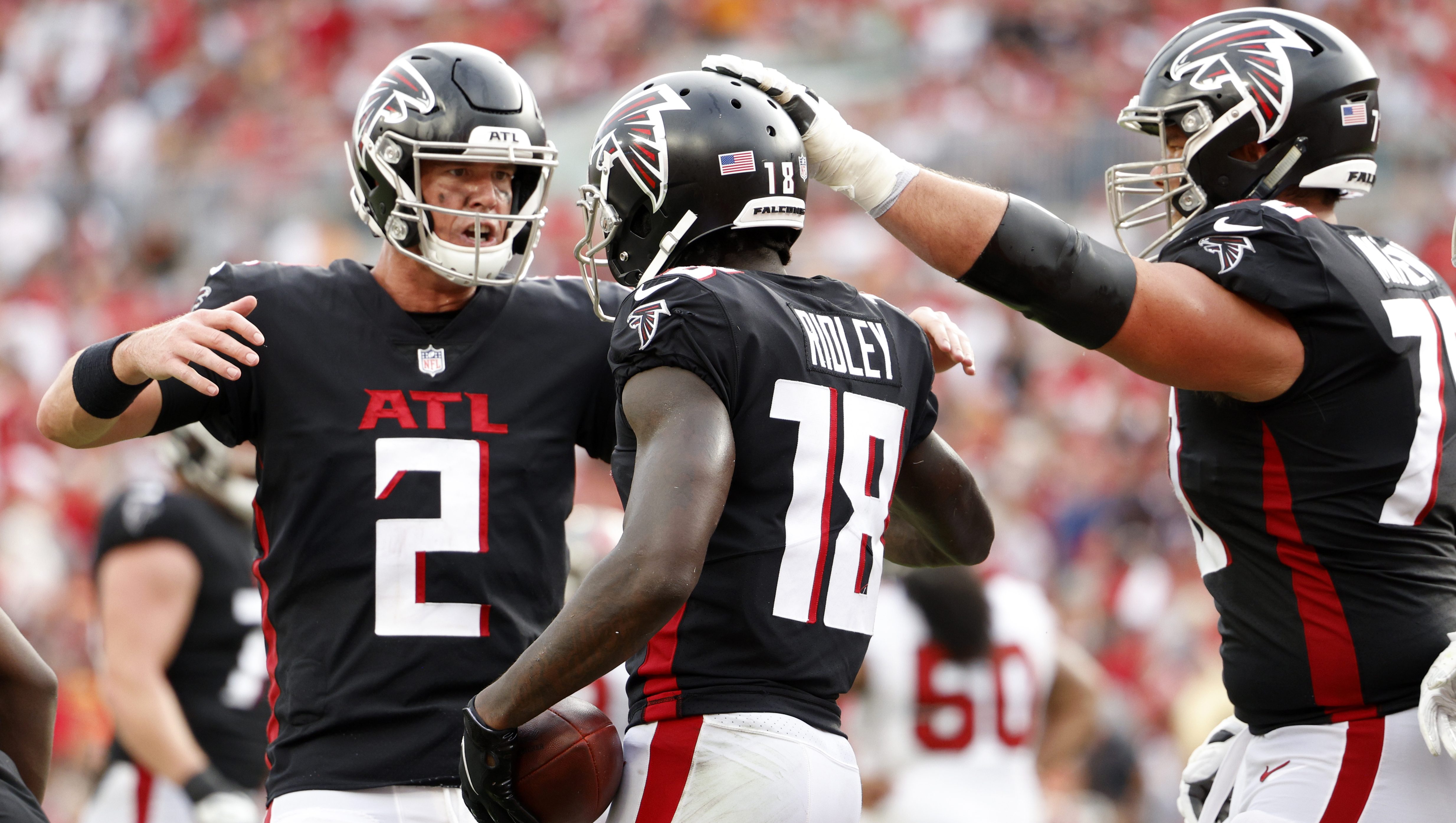 Quarterback Matt Ryan of the Atlanta Falcons celebrates a third