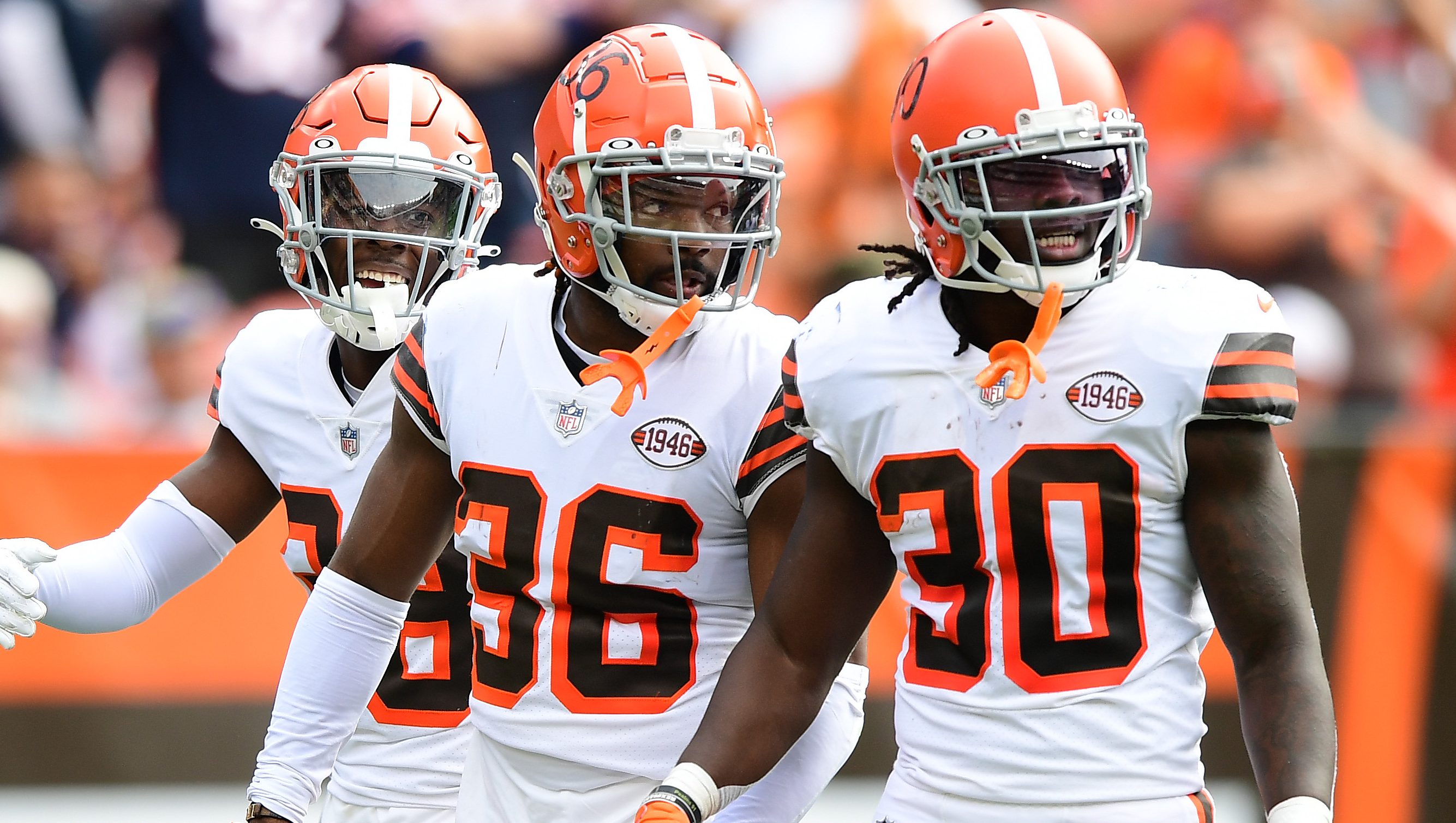 Cleveland Browns D'Ernest Johnson runs behind a block from Justin