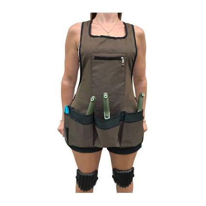 Woman in tan gardening apron and knee pads