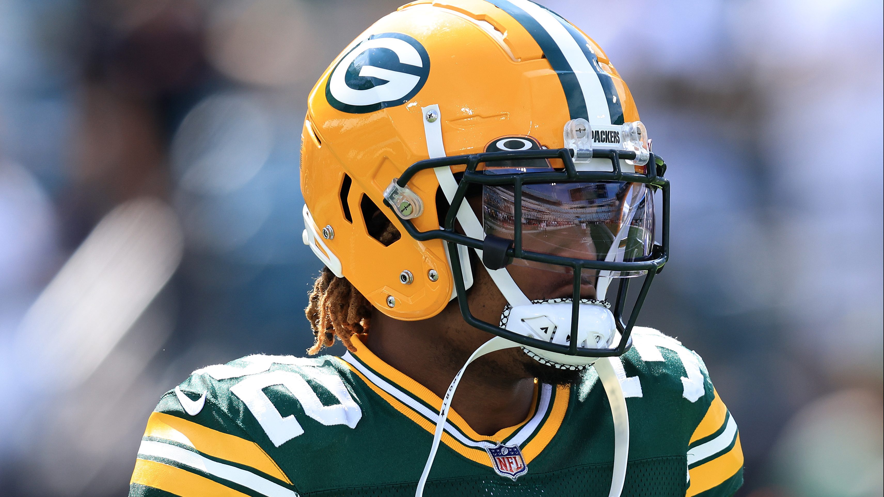 Green Bay Packers WR Romeo Doubs carted to locker room