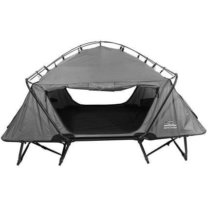 Grey camping cot with tent