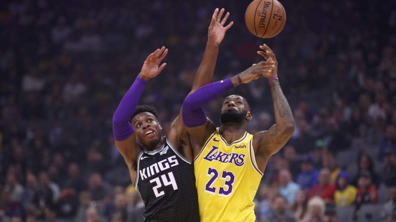 Sacramento's Buddy Hield, left, and LeBron James of the Lakers