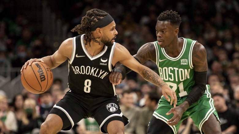 Patty Mills, left, of the Nets, and Dennis Schroder of the Celtics