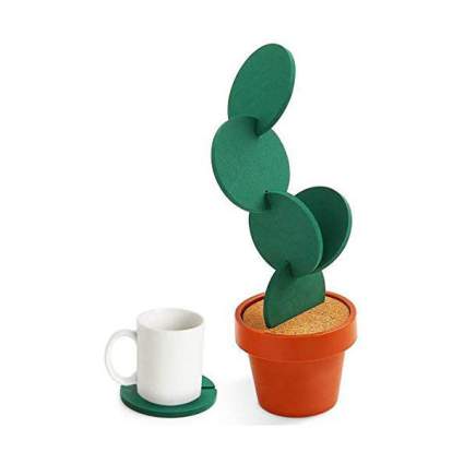 Set of cactus shaped coasters with white mug