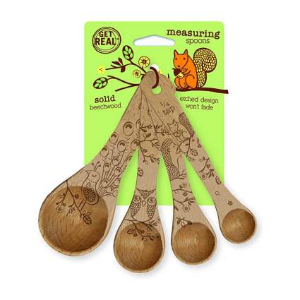 wooden spoons with etched woodland creature designs