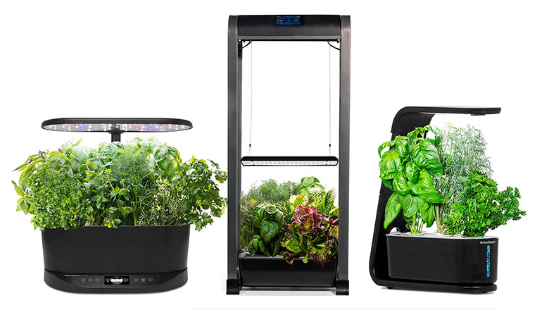 a line of AeroGarden hydroponic gardens in several sizes